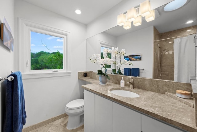 4107 Jefferson St, Austin, TX 78731 - full bathroom with toilet, baseboards, vanity, curtained shower, and tile patterned flooring
