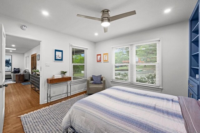 4107 Jefferson St, Austin, TX 78731 - bedroom with wood finished floors, recessed lighting, and a ceiling fan