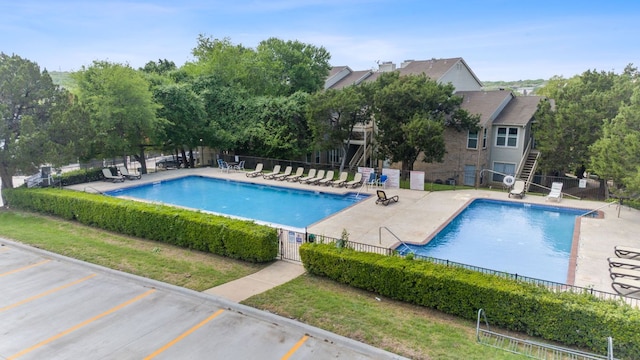 2450 Wickersham Ln Unit 1926, Austin, TX 78741 - community pool with a patio area