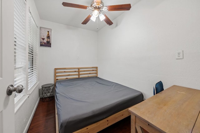 1010 W 23rd St Unit 16, Austin, TX 78705 - bedroom featuring wood finished floors, baseboards, and ceiling fan
