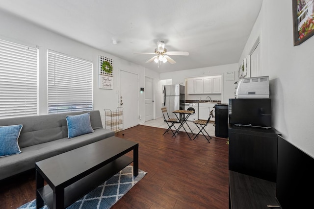 1010 W 23rd St Unit 16, Austin, TX 78705 - living area with washer / clothes dryer, a ceiling fan, and wood finished floors