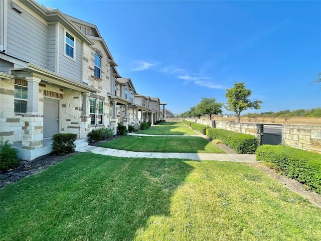 513 N Heatherwilde Blvd, Pflugerville, TX 78660 - view of grassy yard featuring a residential view