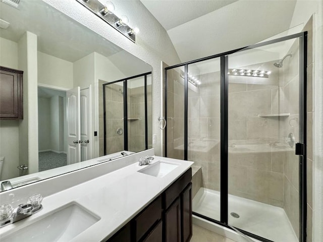 513 N Heatherwilde Blvd, Pflugerville, TX 78660 - bathroom with a stall shower, double vanity, and toilet