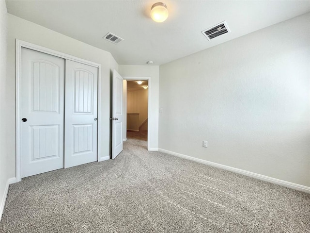513 N Heatherwilde Blvd, Pflugerville, TX 78660 - unfurnished bedroom featuring carpet, baseboards, and a closet