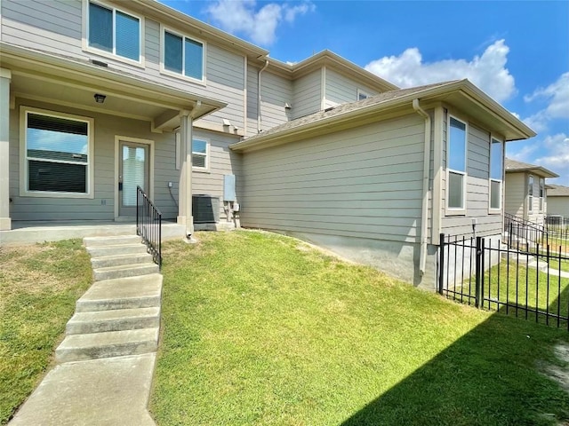 513 N Heatherwilde Blvd, Pflugerville, TX 78660 - back of property featuring entry steps and central AC