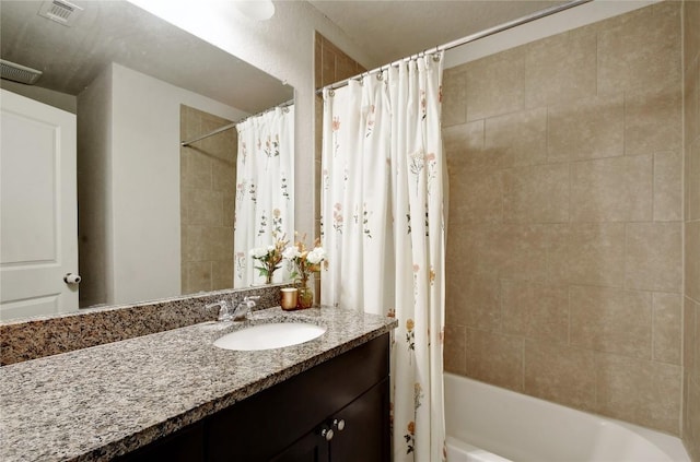 8437 Lamus Wheel, San Antonio, TX 78254 - full bathroom with shower / bath combination with curtain and vanity
