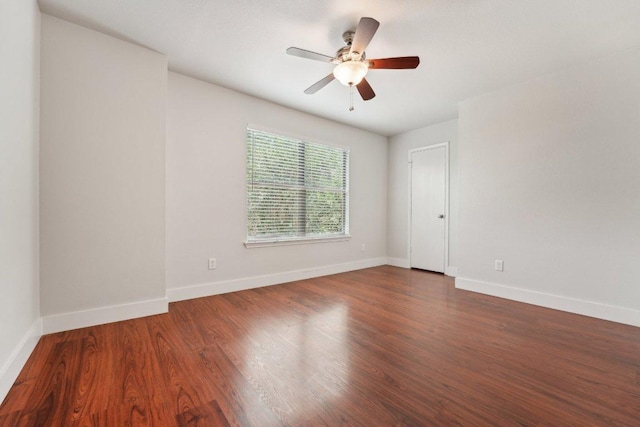100 Blanco Woods Blvd, Elgin, TX 78621 - empty room with baseboards, a ceiling fan, and wood finished floors