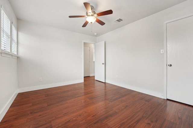 100 Blanco Woods Blvd, Elgin, TX 78621 - unfurnished room with ceiling fan, wood finished floors, and baseboards