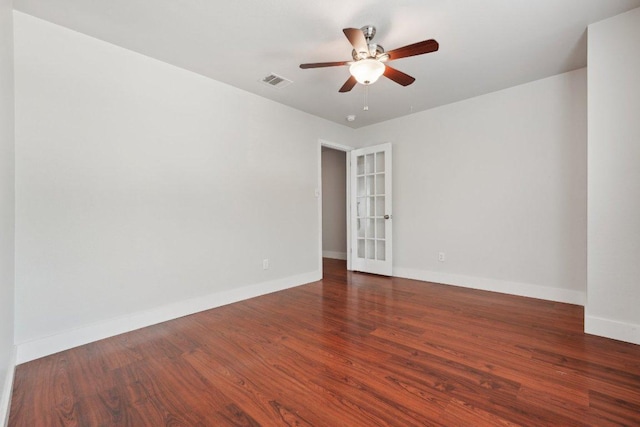 100 Blanco Woods Blvd, Elgin, TX 78621 - empty room featuring a ceiling fan, wood finished floors, and baseboards