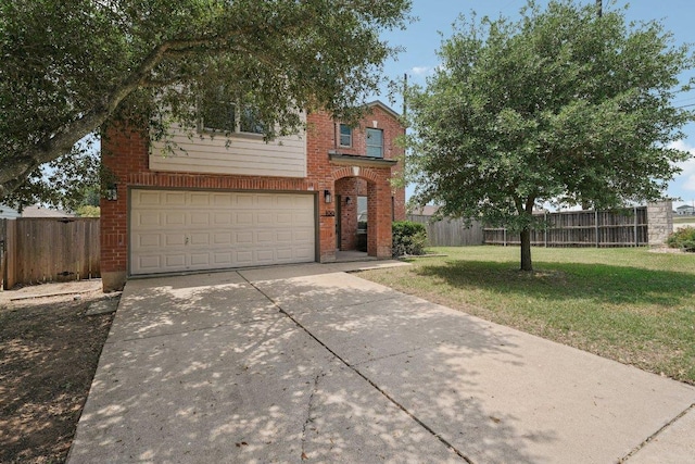 100 Blanco Woods Blvd, Elgin, TX 78621 - view of front of home featuring driveway, an attached garage, and brick siding
