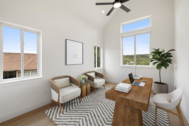 402 Fife Dr, Spicewood, TX 78669 - office featuring wood finished floors, baseboards, a ceiling fan, and high vaulted ceiling