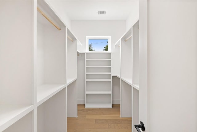 402 Fife Dr, Spicewood, TX 78669 - spacious closet with light wood finished floors