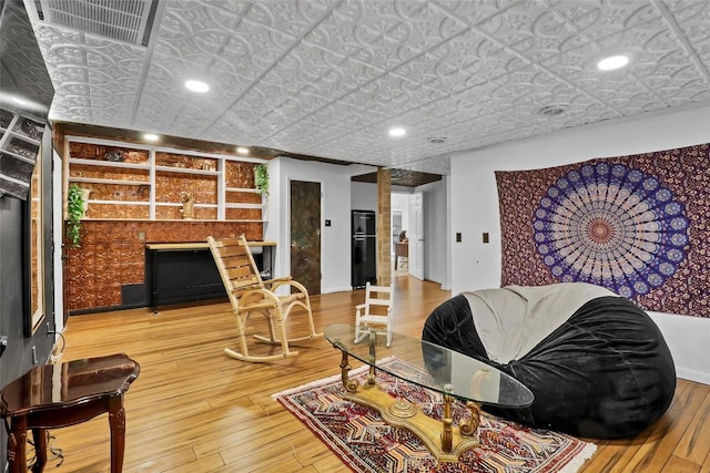 122 W Sierra Cir, San Marcos, TX 78666 - living room with an ornate ceiling, wood-type flooring, and recessed lighting