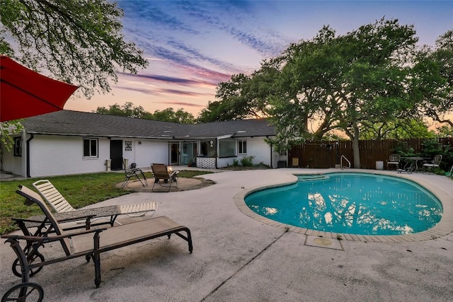 122 W Sierra Cir, San Marcos, TX 78666 - pool at dusk featuring a patio area
