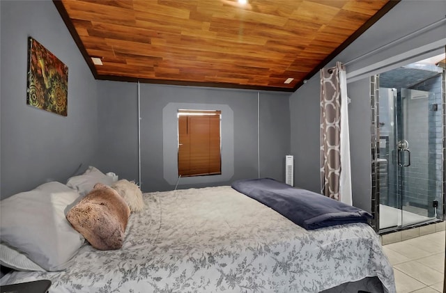 122 W Sierra Cir, San Marcos, TX 78666 - bedroom featuring wood ceiling, vaulted ceiling, and tile patterned flooring