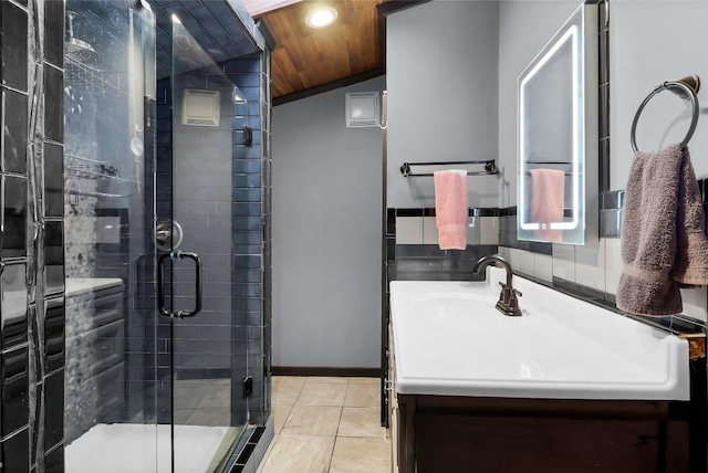 122 W Sierra Cir, San Marcos, TX 78666 - bathroom with vanity, a stall shower, wooden ceiling, lofted ceiling, and baseboards