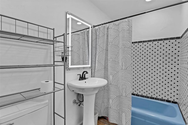 122 W Sierra Cir, San Marcos, TX 78666 - bathroom with toilet, a bath, and curtained shower