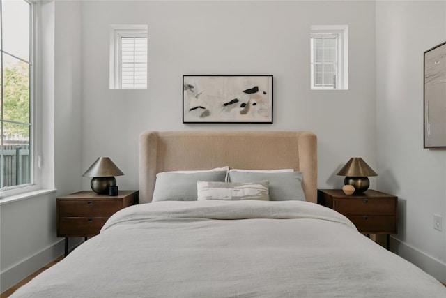 113 Nelray Blvd Unit 1, Austin, TX 78751 - bedroom with baseboards and wood finished floors
