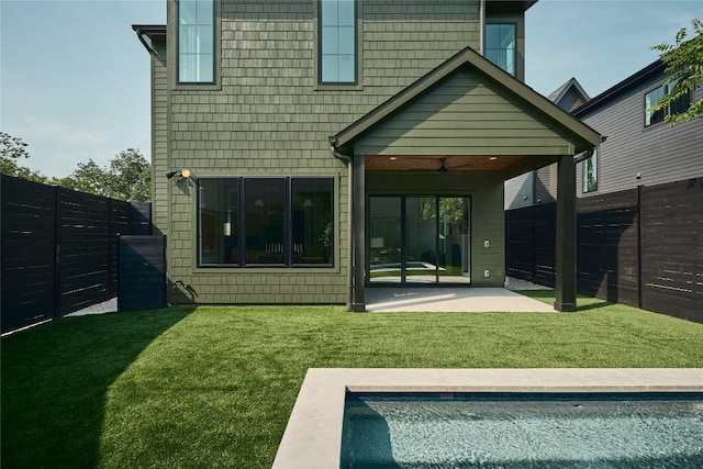 113 Nelray Blvd Unit 1, Austin, TX 78751 - back of house with a patio area, a ceiling fan, and an outdoor pool