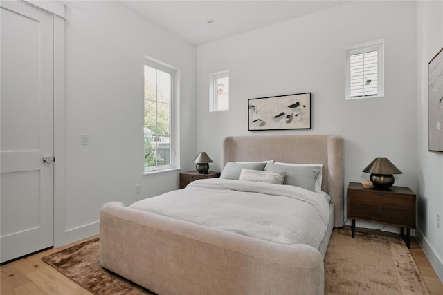 113 Nelray Blvd Unit 1, Austin, TX 78751 - bedroom featuring light wood-style flooring and baseboards