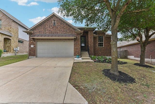 190 Stone View Trl, Austin, TX 78737 - view of front of property with concrete driveway, brick siding, a garage, and a front lawn
