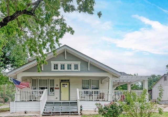 340 Ackerman St, Rockdale, TX 76567 - view of front facade with a porch and a pergola