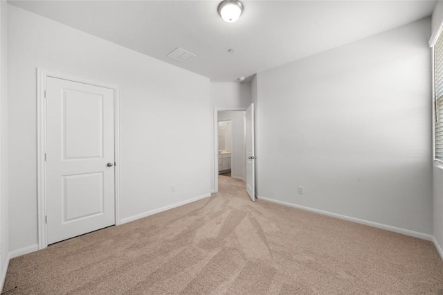 500 Municipal Dr Unit 105, Leander, TX 78641 - unfurnished bedroom featuring light carpet and baseboards