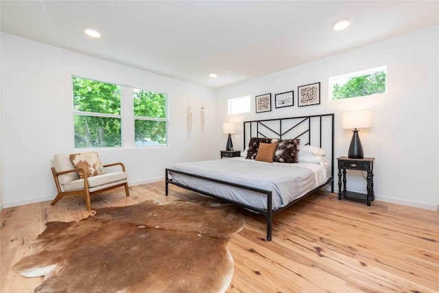 3801 Wilson St, Austin, TX 78704 - bedroom with wood finished floors and recessed lighting