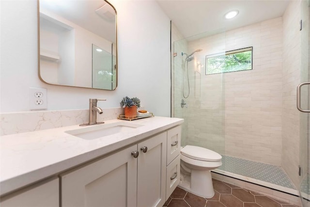3801 Wilson St, Austin, TX 78704 - full bath with vanity, tile patterned flooring, a shower stall, and recessed lighting
