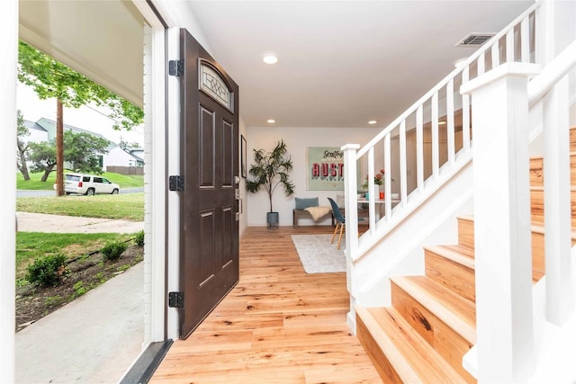 3801 Wilson St, Austin, TX 78704 - entrance foyer featuring light wood-style flooring, stairs, and recessed lighting