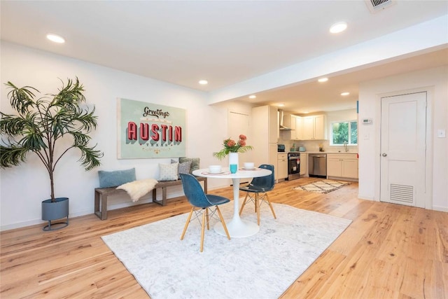 3801 Wilson St, Austin, TX 78704 - dining area with light wood-type flooring and recessed lighting