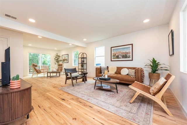 3801 Wilson St, Austin, TX 78704 - living room featuring light wood-style flooring and recessed lighting