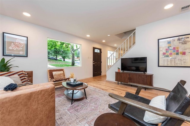 3801 Wilson St, Austin, TX 78704 - living area with stairway, light wood-style flooring, and recessed lighting