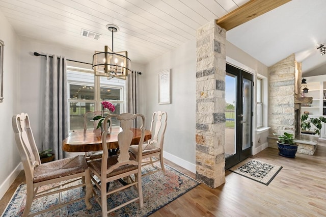 1011 County Road 149, Georgetown, TX 78626 - dining room with wood finished floors and a chandelier