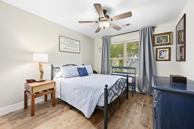 1011 County Road 149, Georgetown, TX 78626 - bedroom featuring light wood finished floors and ceiling fan