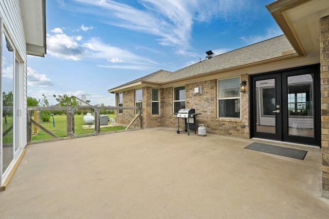 1011 County Road 149, Georgetown, TX 78626 - view of patio with french doors and a grill