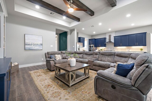 509 Leon Loop, Liberty Hill, TX 78642 - living room featuring recessed lighting, dark wood-style floors, beamed ceiling, ceiling fan, and baseboards