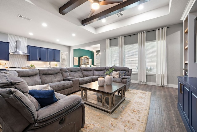 509 Leon Loop, Liberty Hill, TX 78642 - living room with a ceiling fan, plenty of natural light, dark wood-type flooring, recessed lighting, and beam ceiling