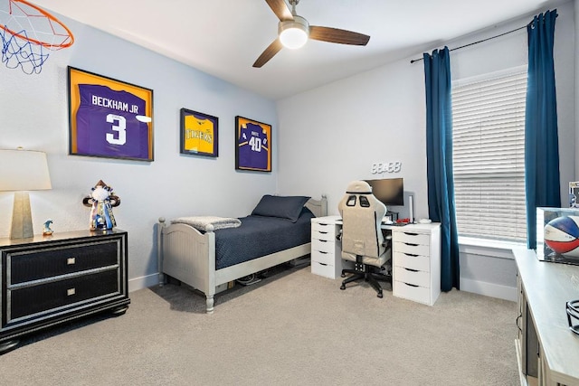 509 Leon Loop, Liberty Hill, TX 78642 - carpeted bedroom with a desk, baseboards, and a ceiling fan