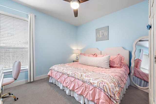 509 Leon Loop, Liberty Hill, TX 78642 - carpeted bedroom featuring a ceiling fan and baseboards
