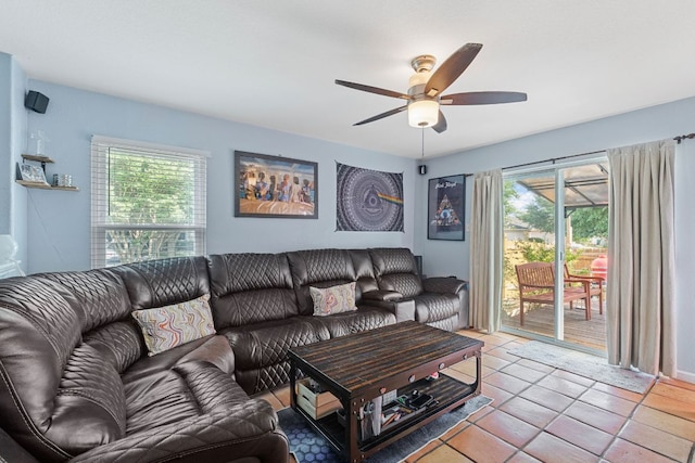 101 Texas Ash Cv, Manchaca, TX 78652 - living area featuring healthy amount of natural light, ceiling fan, and light tile patterned flooring