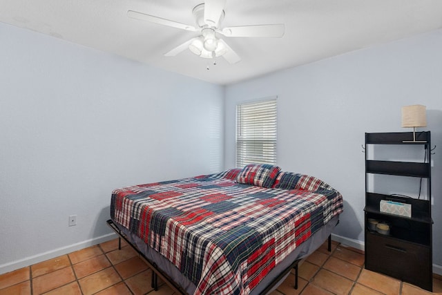 101 Texas Ash Cv, Manchaca, TX 78652 - tiled bedroom with baseboards and ceiling fan