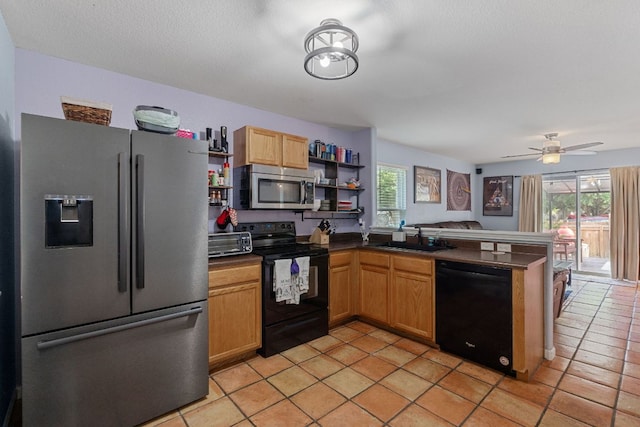 101 Texas Ash Cv, Manchaca, TX 78652 - kitchen with black appliances, open shelves, a sink, and healthy amount of natural light