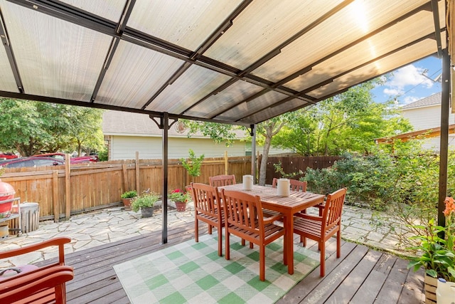 101 Texas Ash Cv, Manchaca, TX 78652 - wooden deck with a fenced backyard and outdoor dining area
