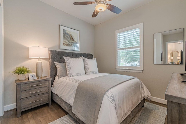 213 Sowing Oak Dr, San Marcos, TX 78666 - bedroom with wood finished floors, baseboards, and ceiling fan