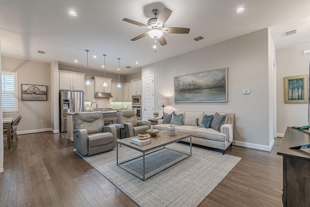 213 Sowing Oak Dr, San Marcos, TX 78666 - living area with a ceiling fan, baseboards, dark wood finished floors, and recessed lighting