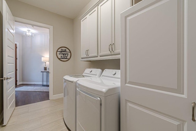 213 Sowing Oak Dr, San Marcos, TX 78666 - laundry area featuring separate washer and dryer, cabinet space, and baseboards