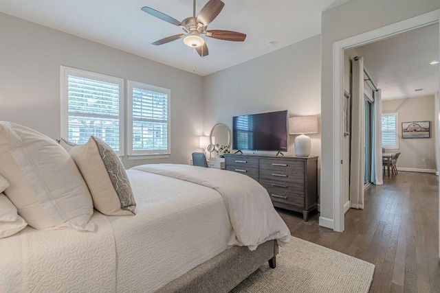 213 Sowing Oak Dr, San Marcos, TX 78666 - bedroom with dark wood-type flooring, baseboards, and a ceiling fan