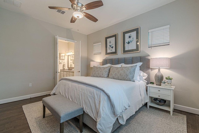 213 Sowing Oak Dr, San Marcos, TX 78666 - bedroom with baseboards, wood finished floors, ensuite bathroom, and a ceiling fan