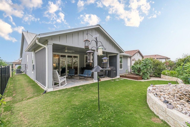 433 Skipping Cedar St, San Marcos, TX 78666 - back of property with a ceiling fan, a patio, board and batten siding, and outdoor lounge area